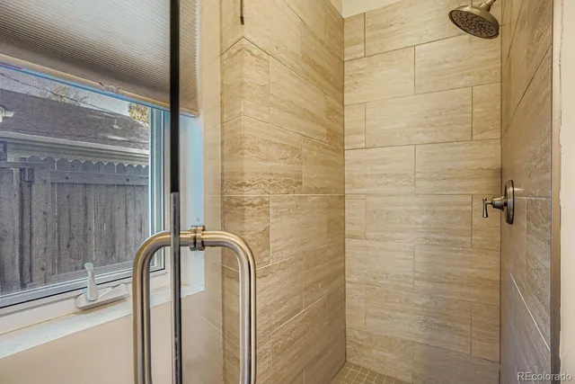 a close view of a shower in bathroom