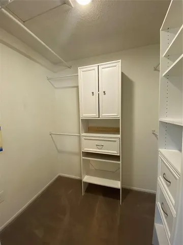 a view of an empty walk in closet