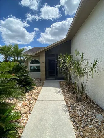 a picture of a house with a yard