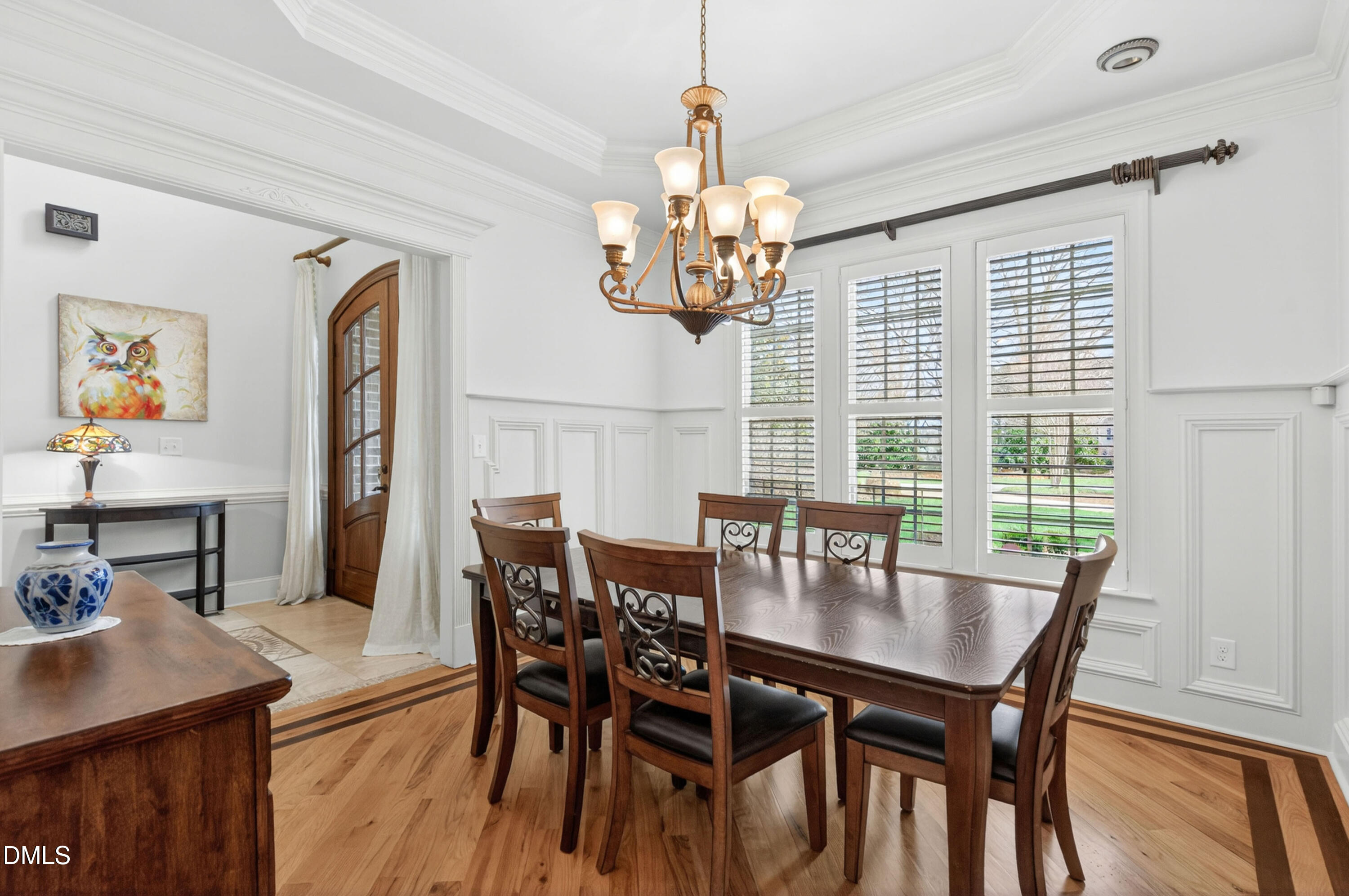 691 Hawthorne Place Creedmoor, NC 27522 - Photo 26 of 84 a view of a dining room with furniture window and wooden floor