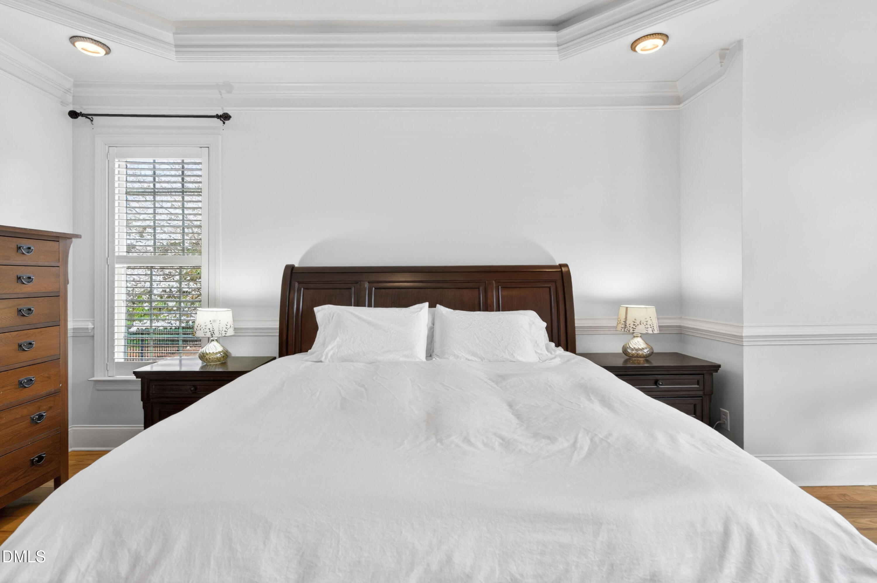 691 Hawthorne Place Creedmoor, NC 27522 - Photo 29 of 84 a large white bed in a bedroom next to a window