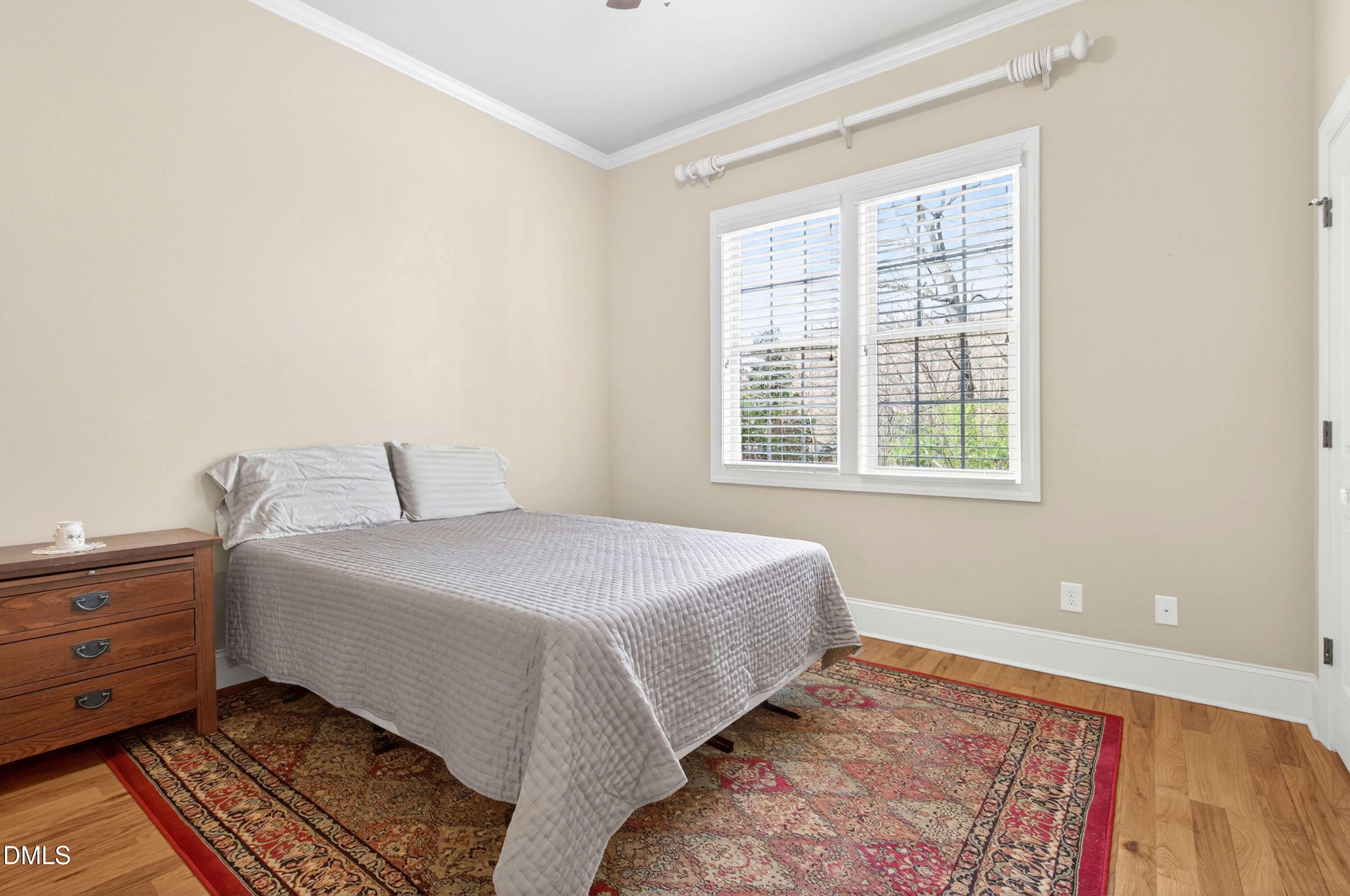 691 Hawthorne Place Creedmoor, NC 27522 - Photo 45 of 84 a bedroom with a bed and a window