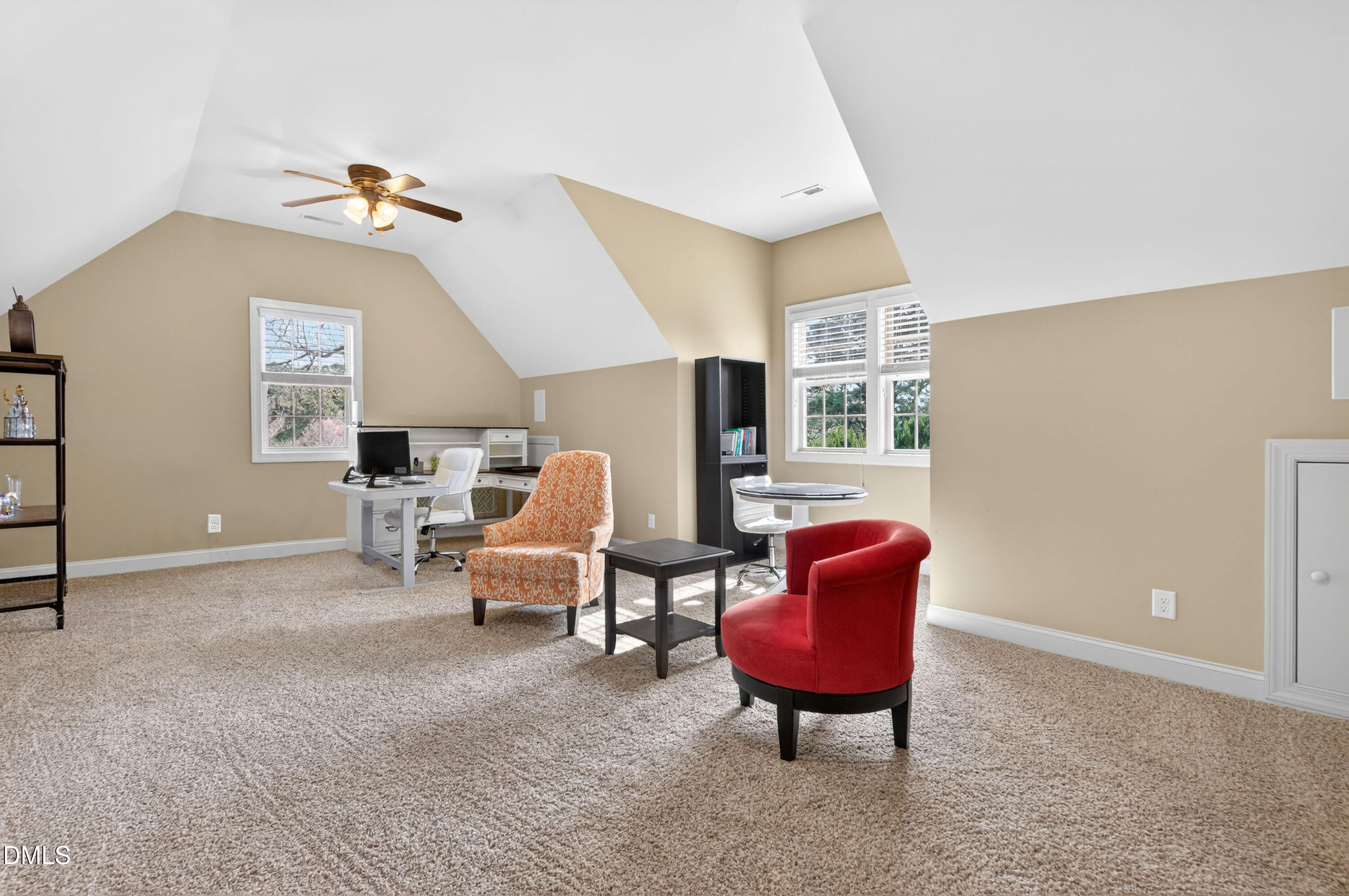 691 Hawthorne Place Creedmoor, NC 27522 - Photo 64 of 84 a living room with furniture rug and a window