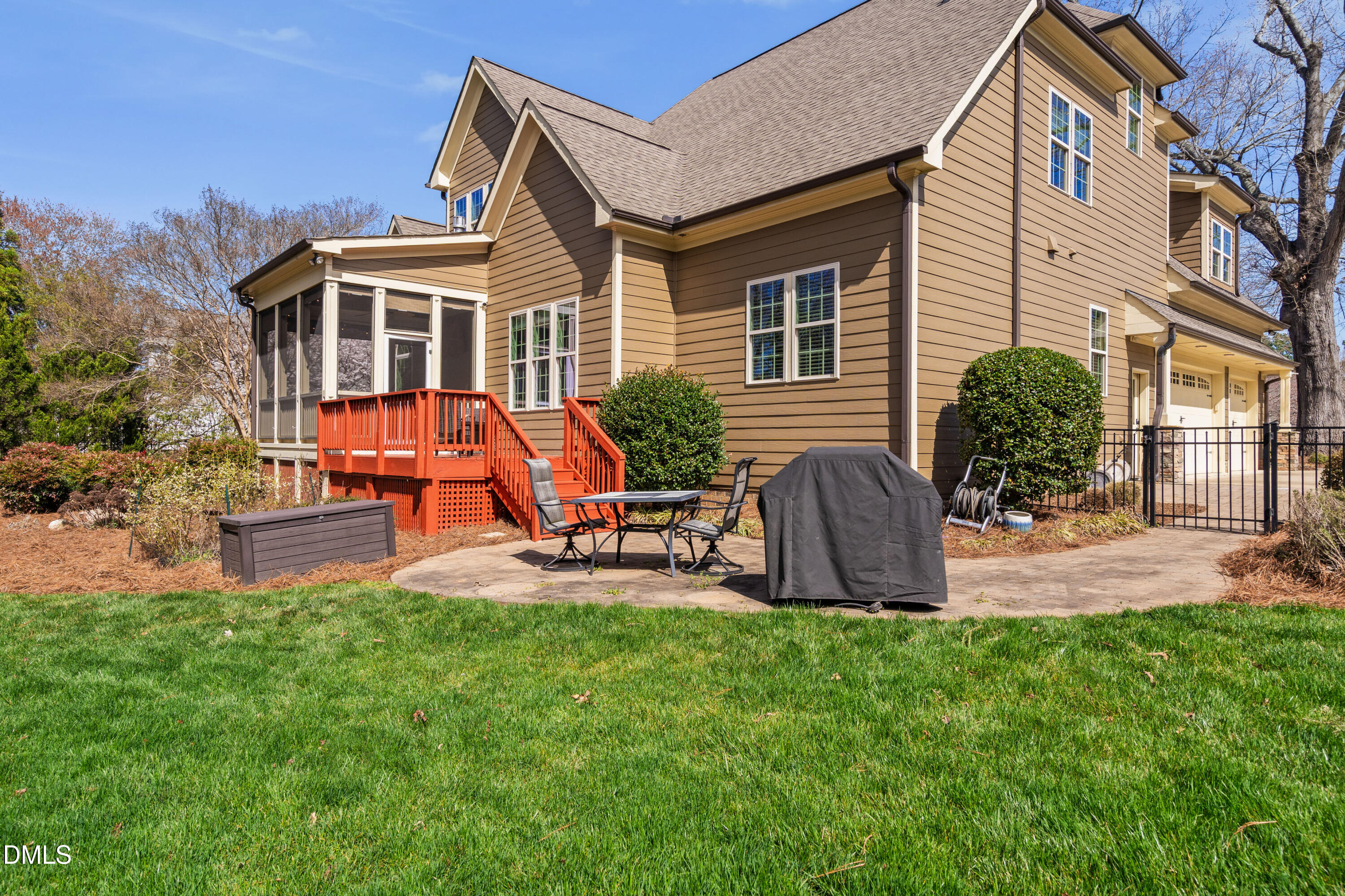 691 Hawthorne Place Creedmoor, NC 27522 - Photo 76 of 84 a view of a house with a yard and sitting area