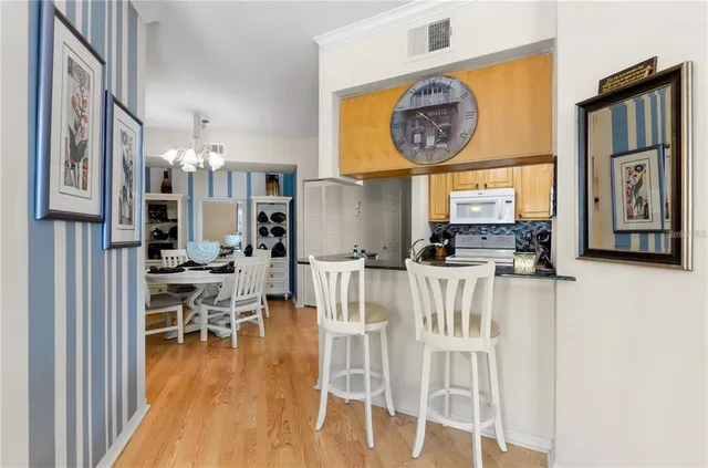 a view of kitchen with breakfast area