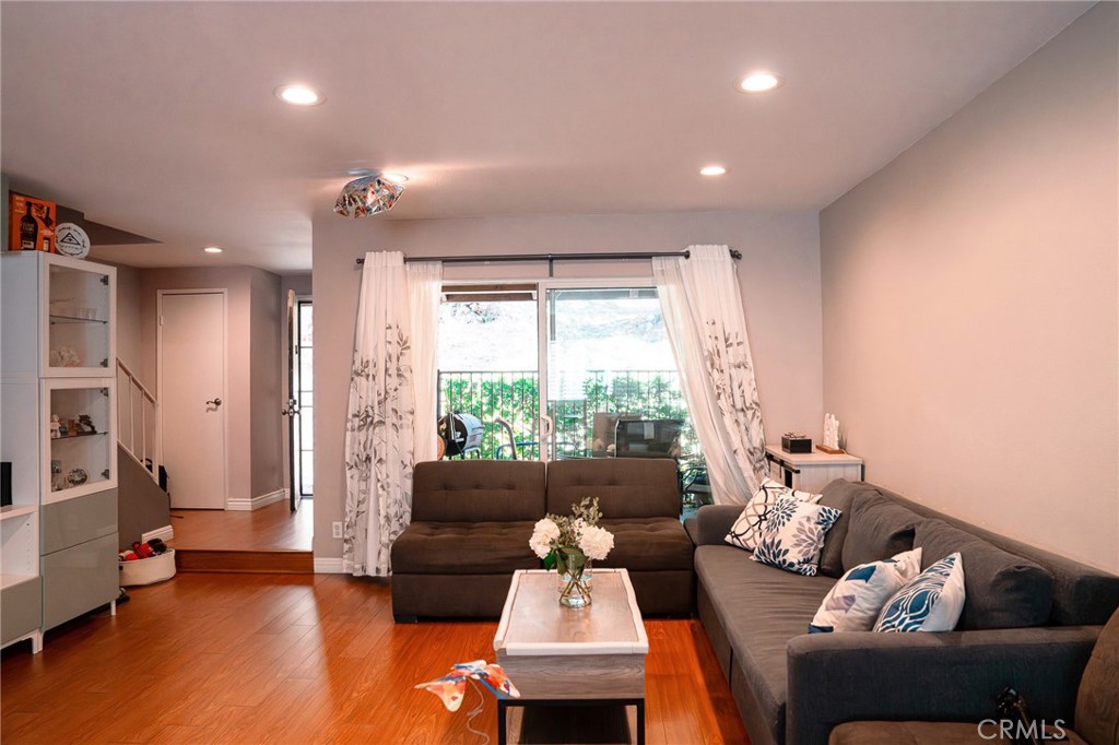 9759 Vía Roma Burbank, CA 91504 - Photo 1 of 29 a living room with furniture and a large window