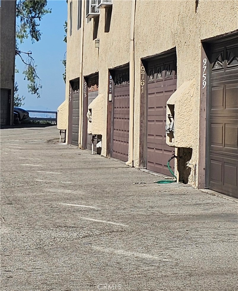 9759 Vía Roma Burbank, CA 91504 - Photo 20 of 29 a view of a building with a street
