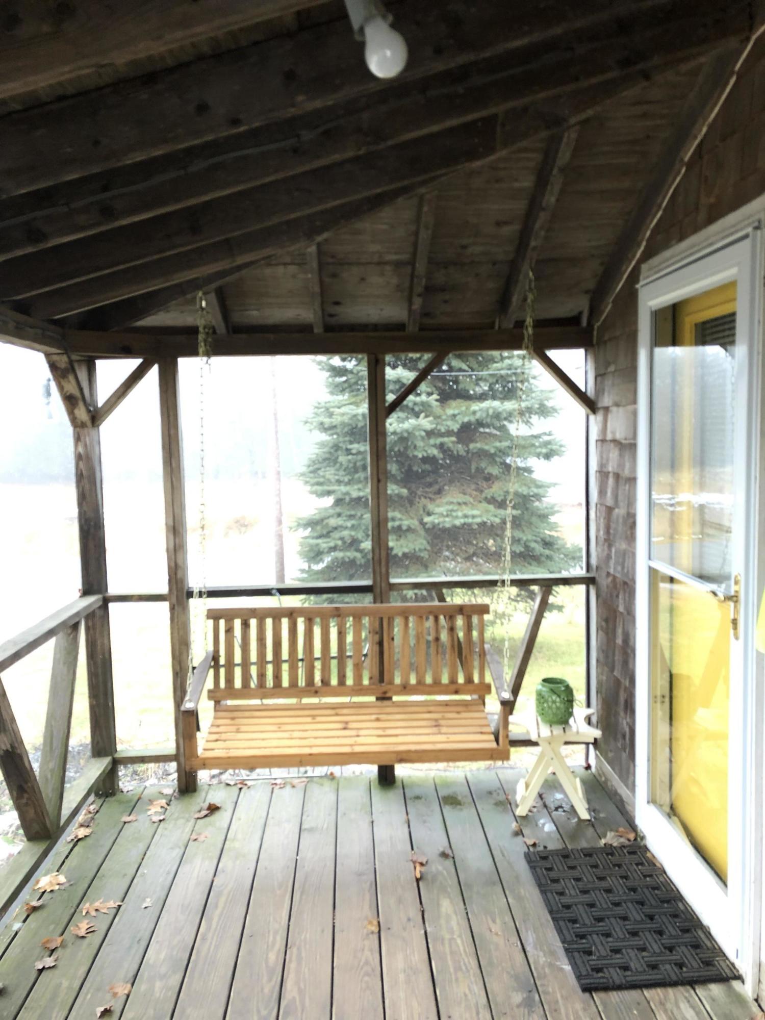190 Priest Road Northport, ME 04849 - Photo 3 of 14 Beautiful screened in summer porch.