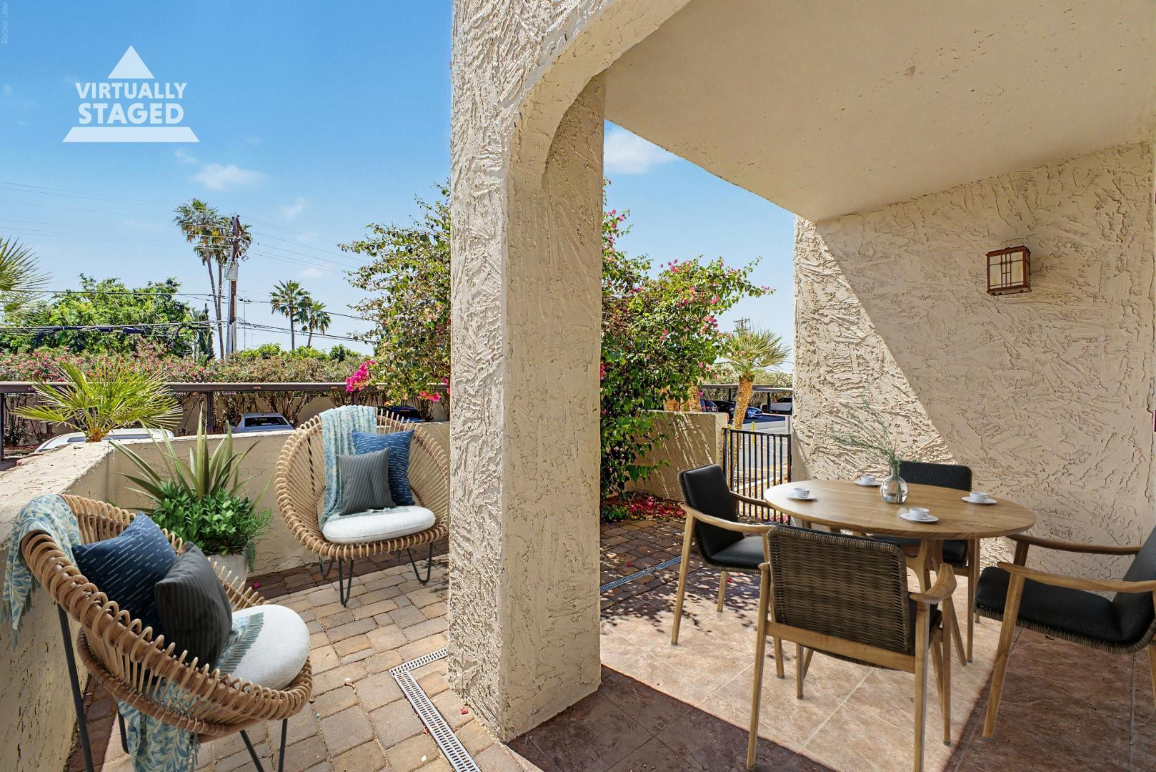 3825 East Camelback Road, Unit 144 Phoenix, AZ 85018 - Photo 19 of 35 a view of a chairs and table in a patio