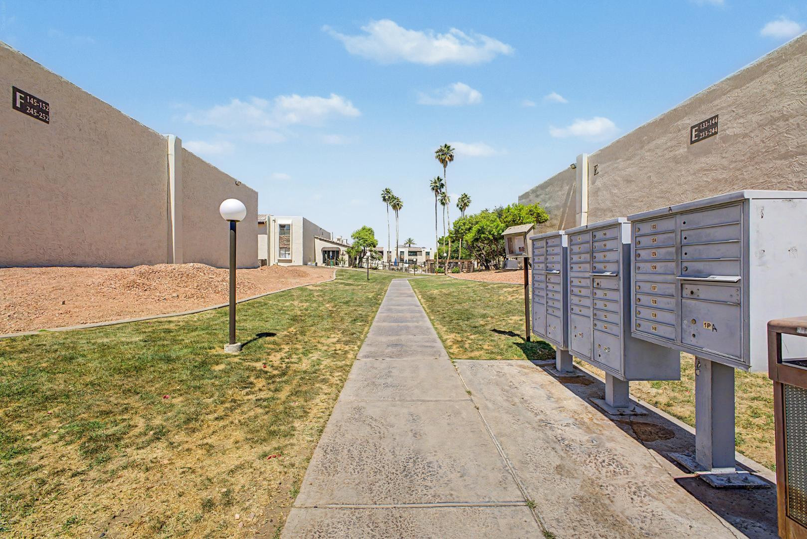 3825 East Camelback Road, Unit 144 Phoenix, AZ 85018 - Photo 26 of 35 a view of a backyard of the house