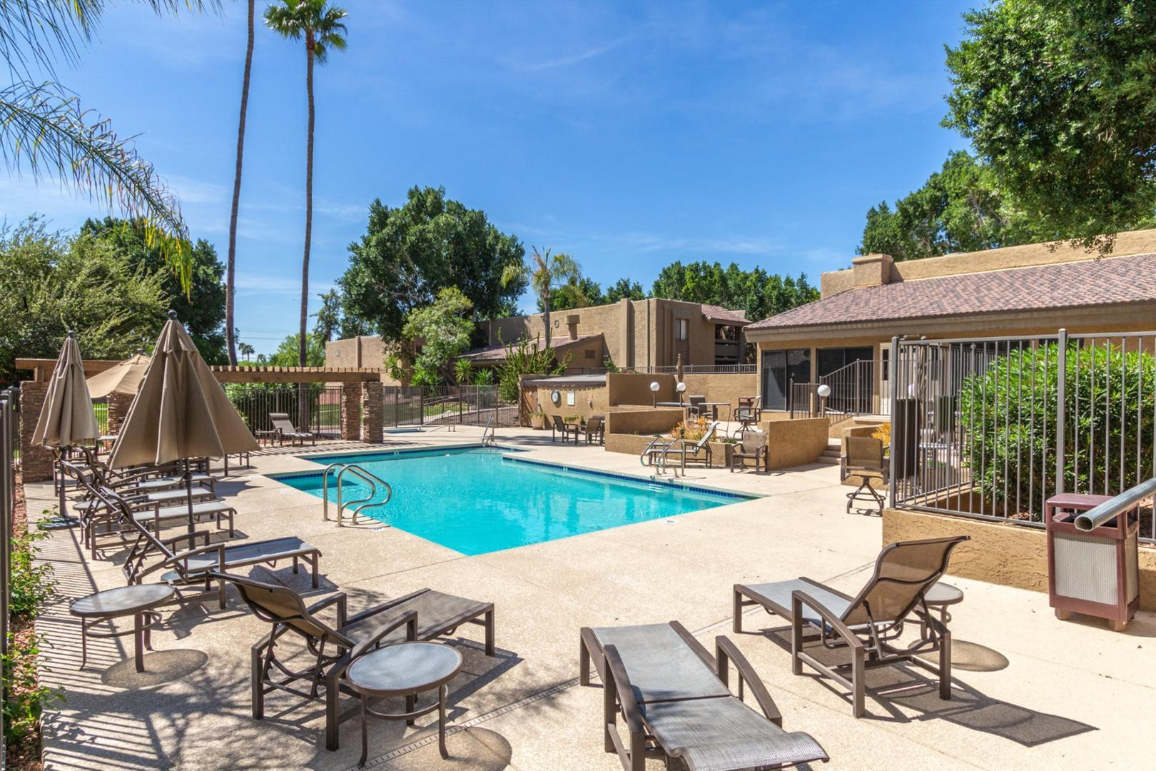 3825 East Camelback Road, Unit 144 Phoenix, AZ 85018 - Photo 33 of 35 a view of a backyard with plants and patio