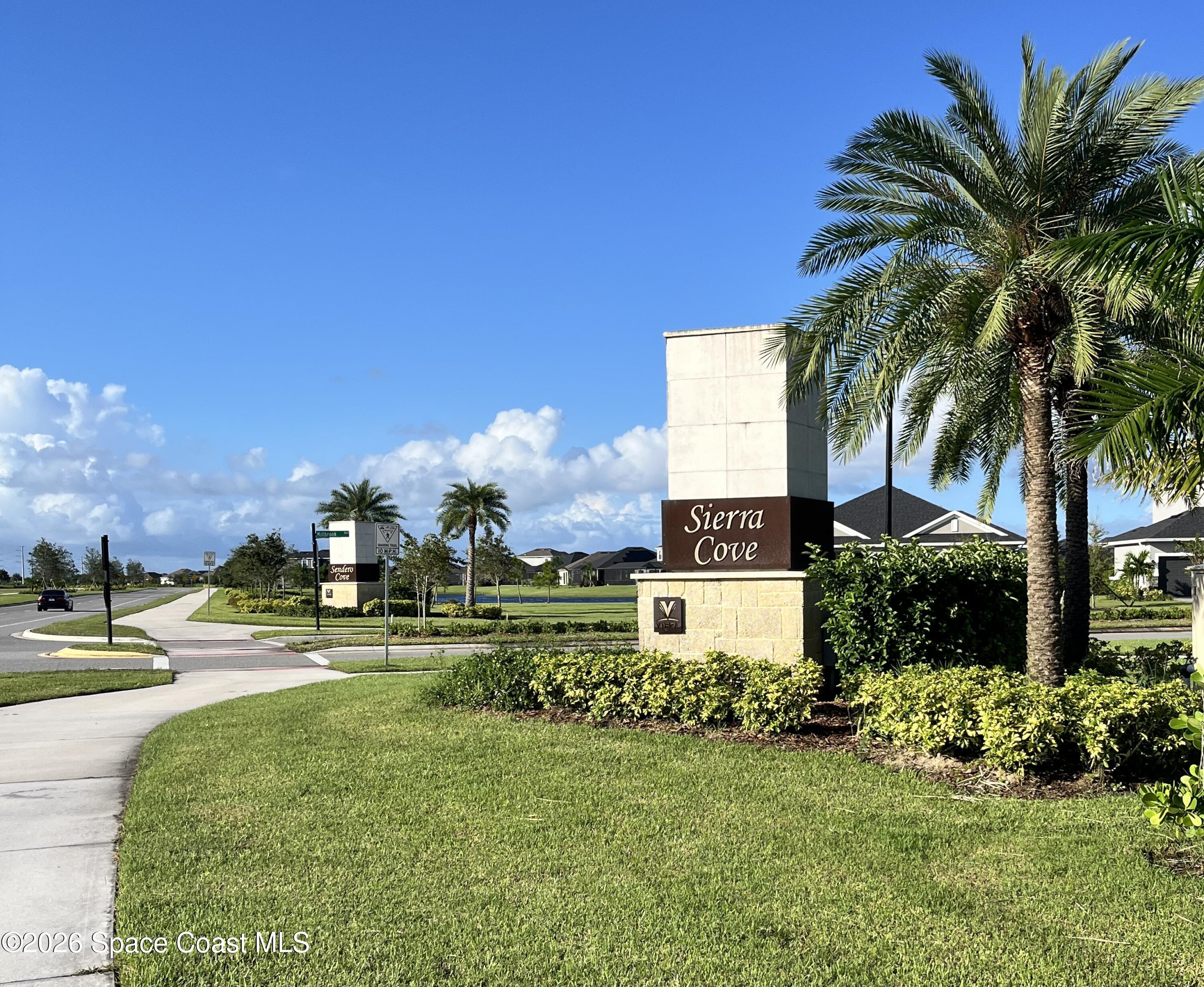 3236 Becorden Way Melbourne, FL 32940 - Photo 38 of 40 a front view of a house with garden