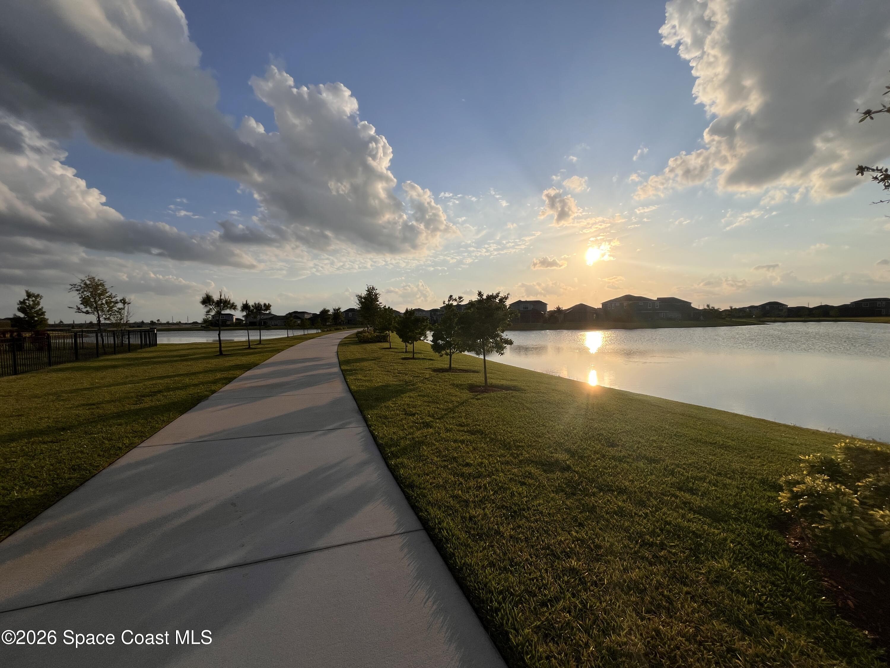 3236 Becorden Way Melbourne, FL 32940 - Photo 39 of 40 a view of a lake with a outdoor space