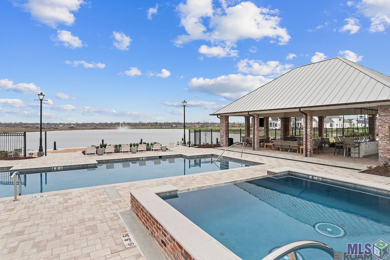 2602 Morning Mist Drive Baton Rouge, LA 70810 - Photo 4 of 8 Views of Both Pools as well as the fishing pier and gorgeous lake