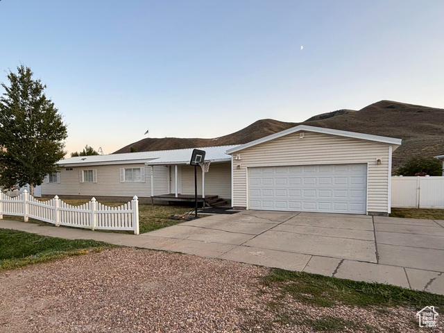 View of front of property featuring driveway
