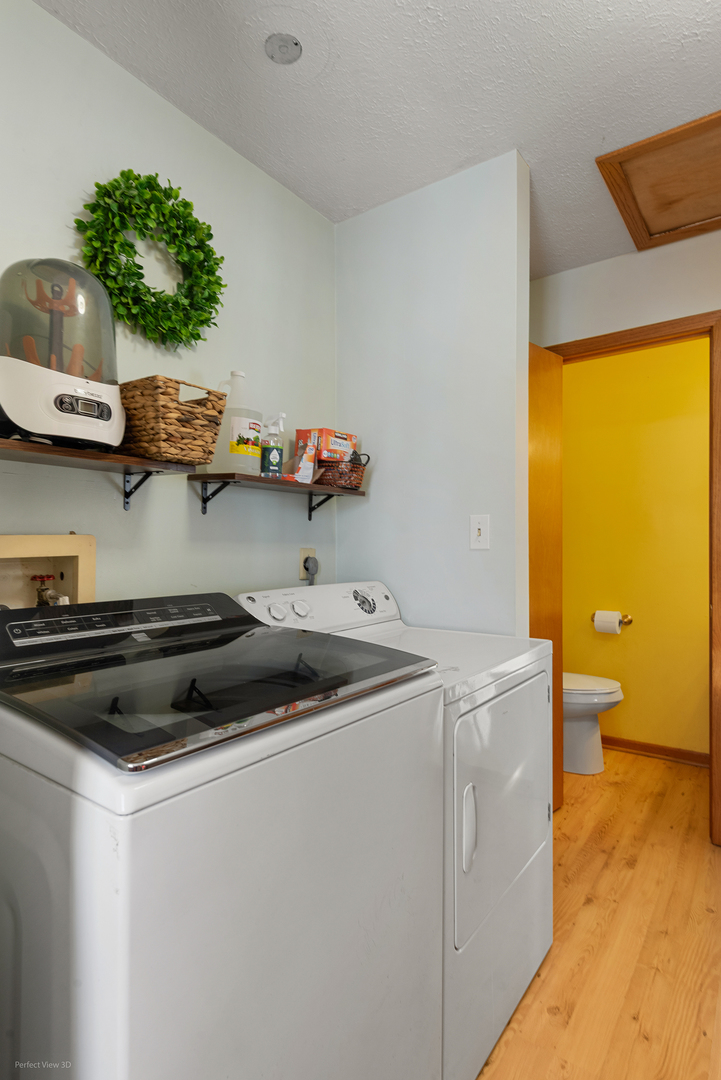 32209 North 1500 E Road Blackstone, IL 61313 - Photo 12 of 23 a kitchen that has a sink and a stove