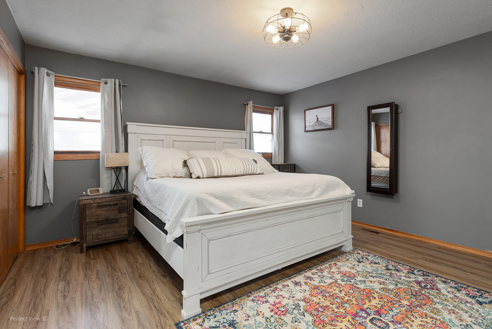 32209 North 1500 E Road Blackstone, IL 61313 - Photo 13 of 23 a bed sitting in a bedroom next to a window