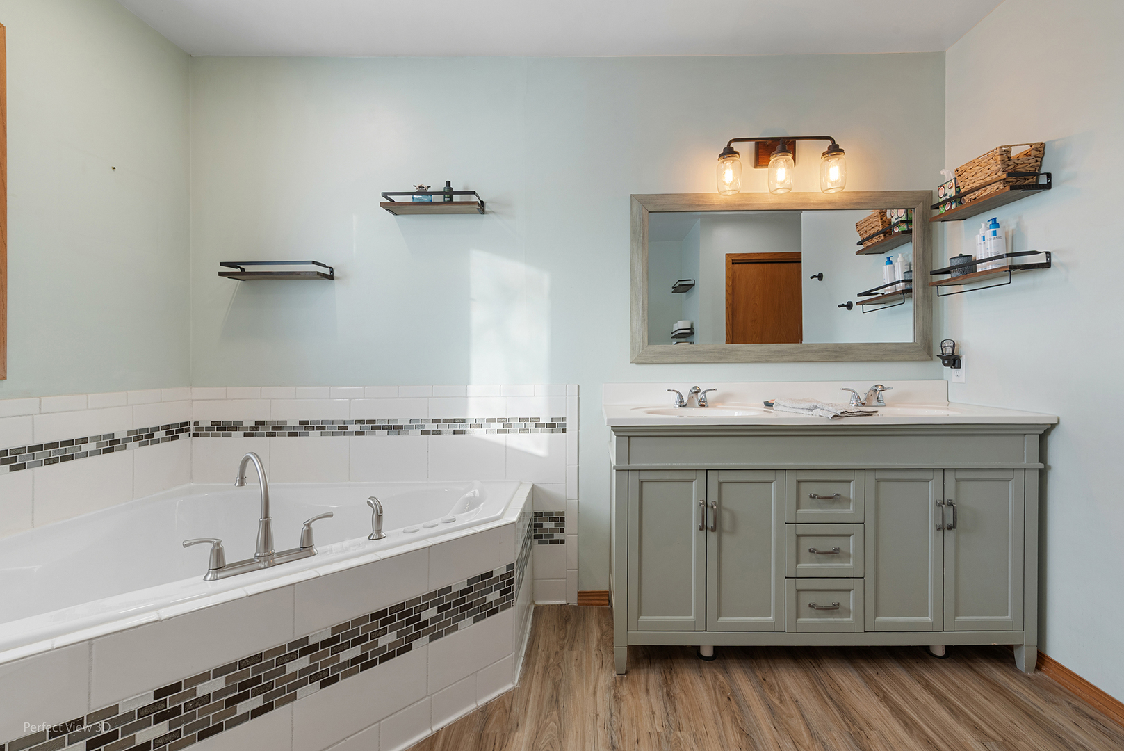 32209 North 1500 E Road Blackstone, IL 61313 - Photo 16 of 23 a bathroom with a double vanity sink a mirror and a bathtub