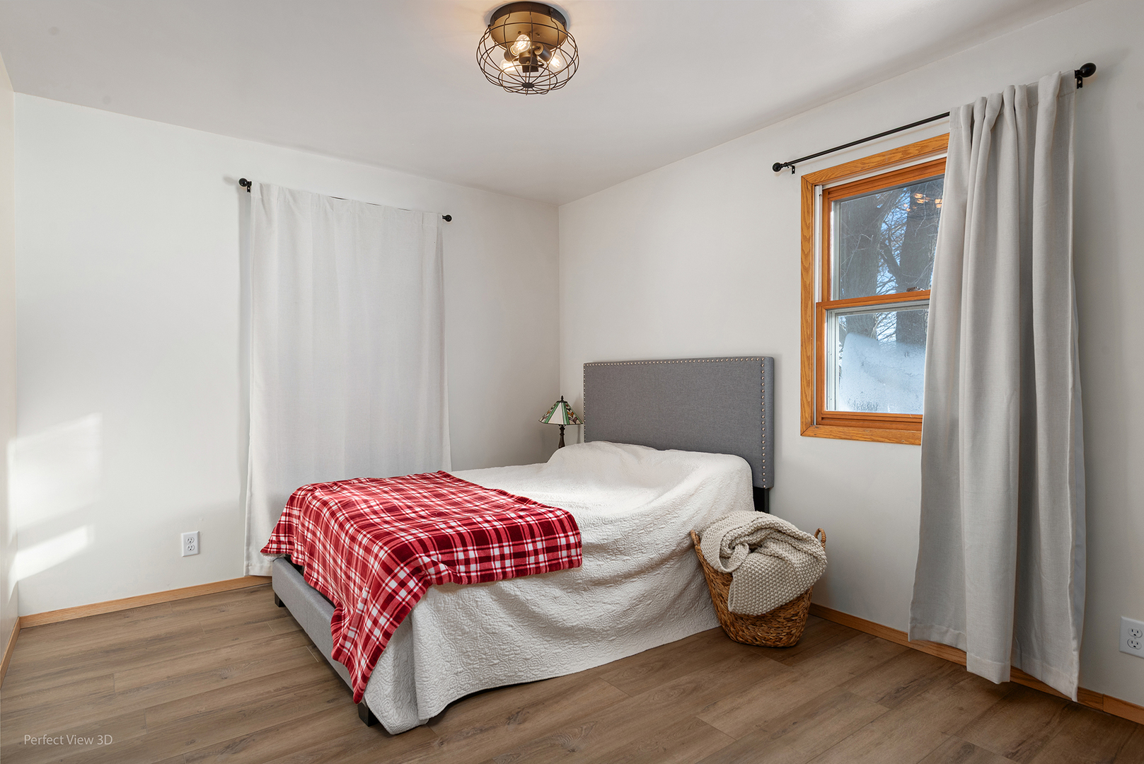 32209 North 1500 E Road Blackstone, IL 61313 - Photo 20 of 23 a bedroom with a bed and wooden floor