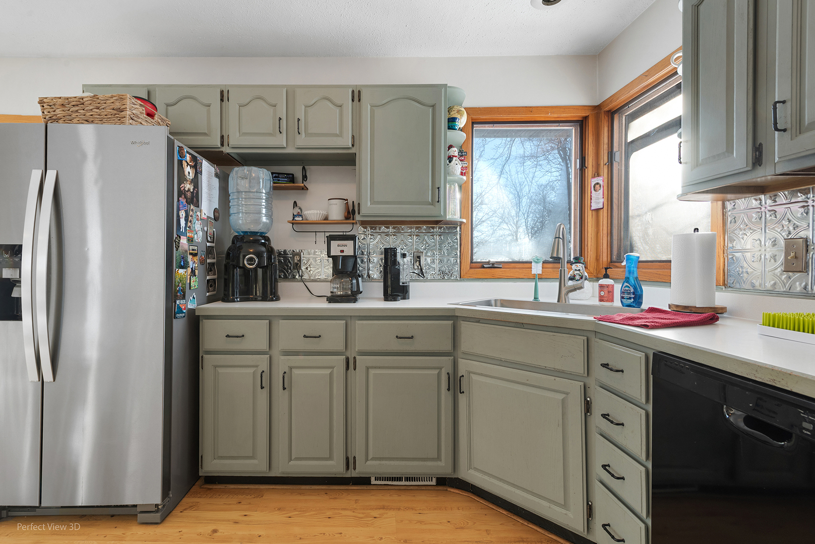 32209 North 1500 E Road Blackstone, IL 61313 - Photo 8 of 23 a kitchen with stainless steel appliances a sink cabinets and a window