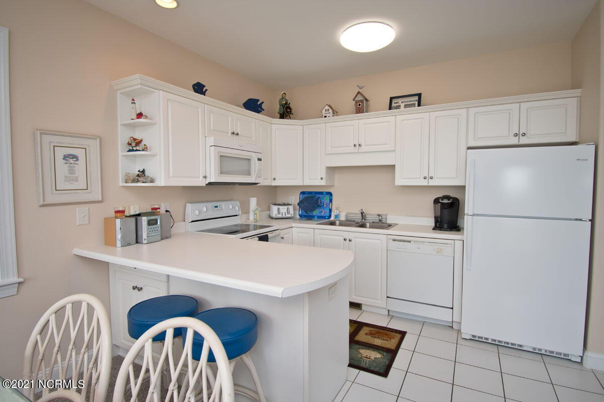 1701 Salter Path Road, Unit 104F Indian Beach, NC 28512 - Photo 12 of 39 Kitchen
