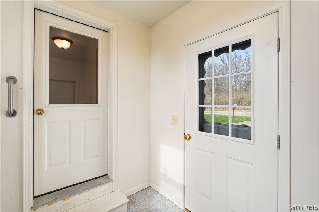 8 Walker Road Castile, NY 14530 - Photo 45 of 50 Door to House from Garage