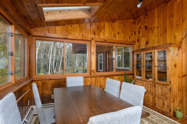 a view of a living room with a large window