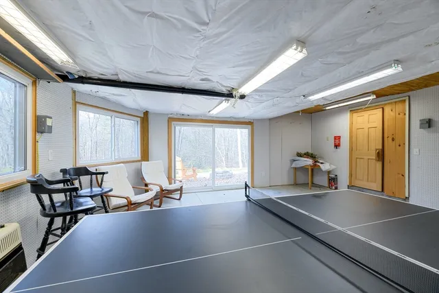 a lobby with furniture and windows