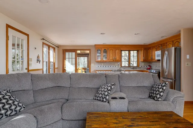 a living room with furniture window and a table