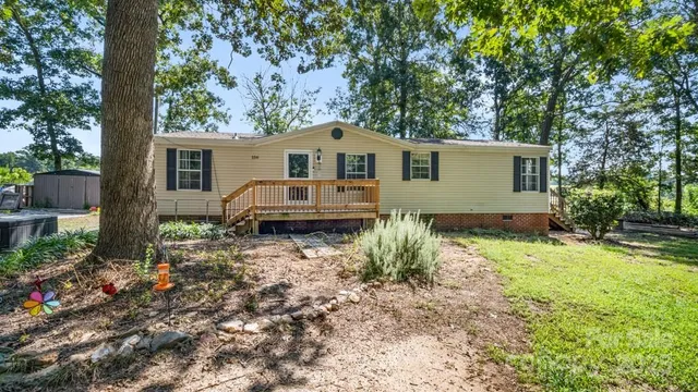 a house with trees in the background