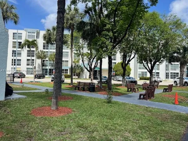 a view of a park with swings