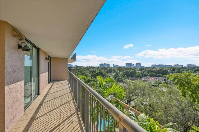 a view of balcony with furniture