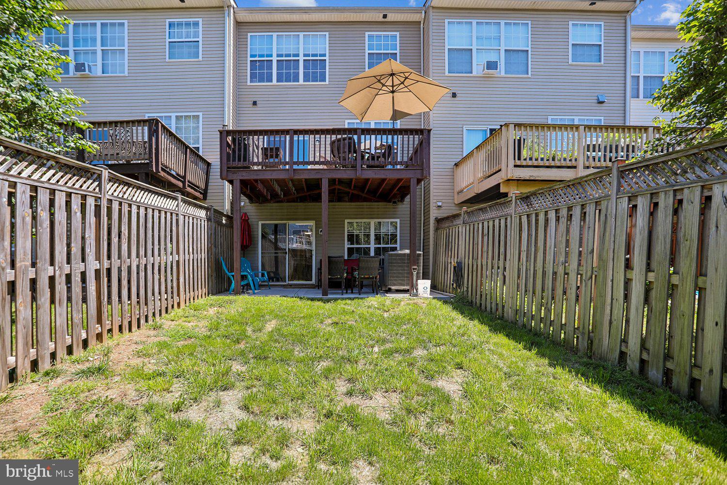 2530 Carrington Way Frederick, MD 21702 - Photo 34 of 38 a view of a house with wooden fence