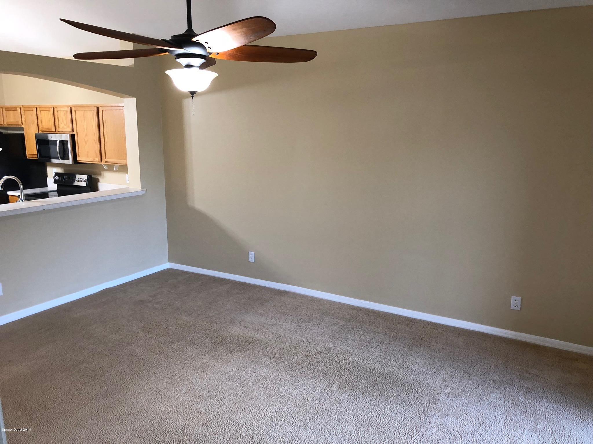 314 Intrepid Way Melbourne, FL 32903 - Photo 11 of 31 a view of an empty room with a window