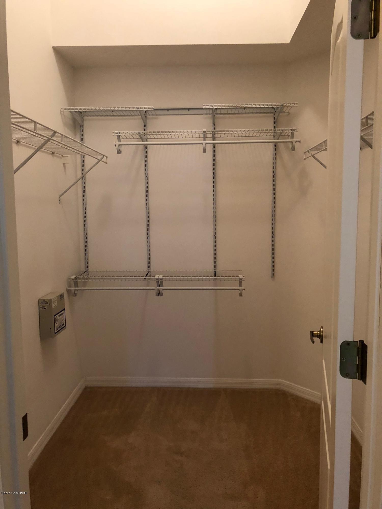 314 Intrepid Way Melbourne, FL 32903 - Photo 23 of 31 a view of a room with racks on the wall