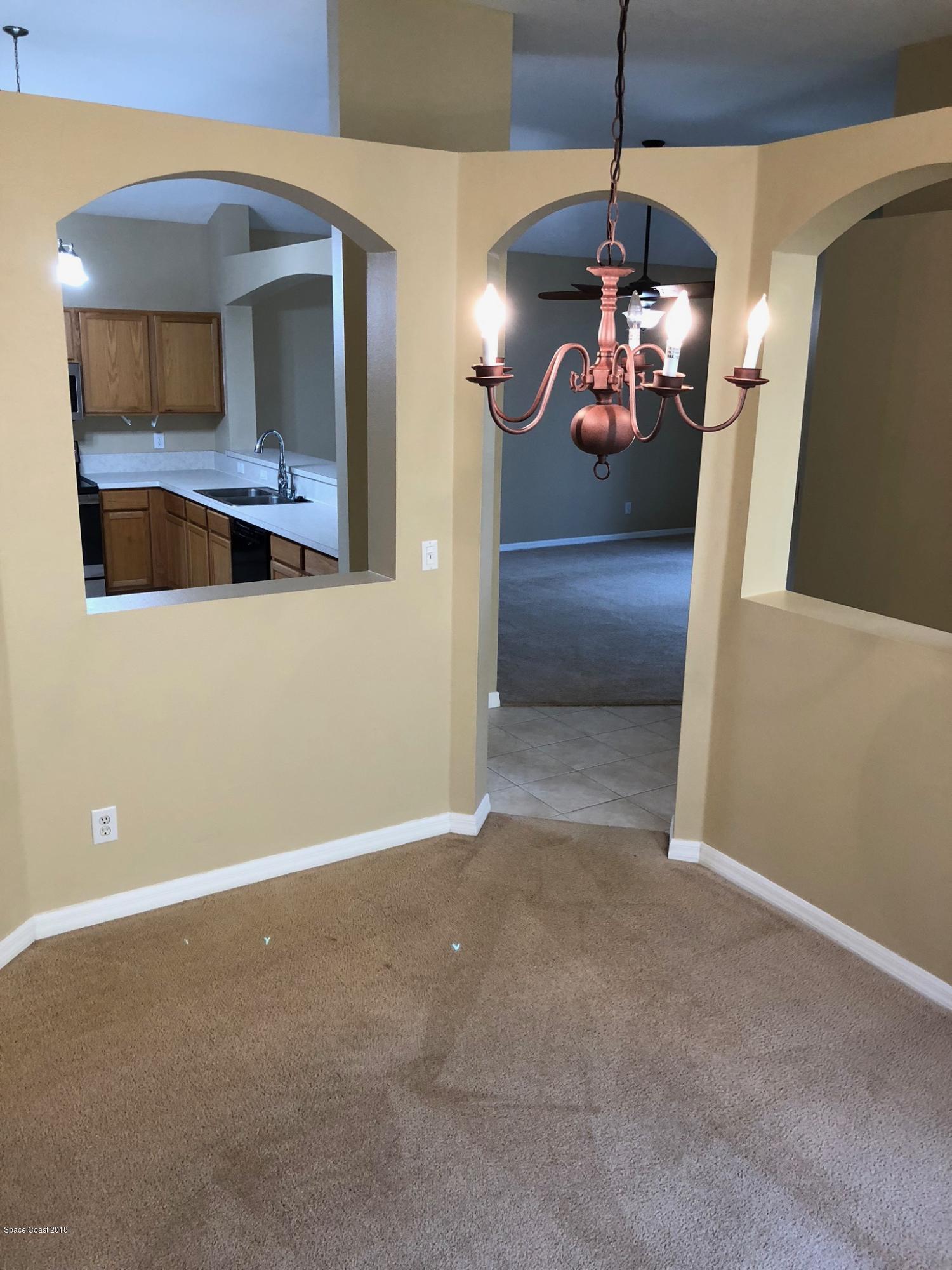 314 Intrepid Way Melbourne, FL 32903 - Photo 7 of 31 a view of a livingroom with a furniture