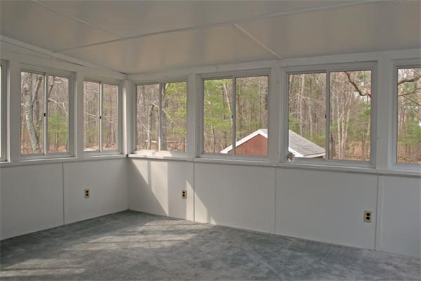 85 Wildwood Road Lunenburg, MA 01462 - Photo 8 of 15 a view of an empty room with a window