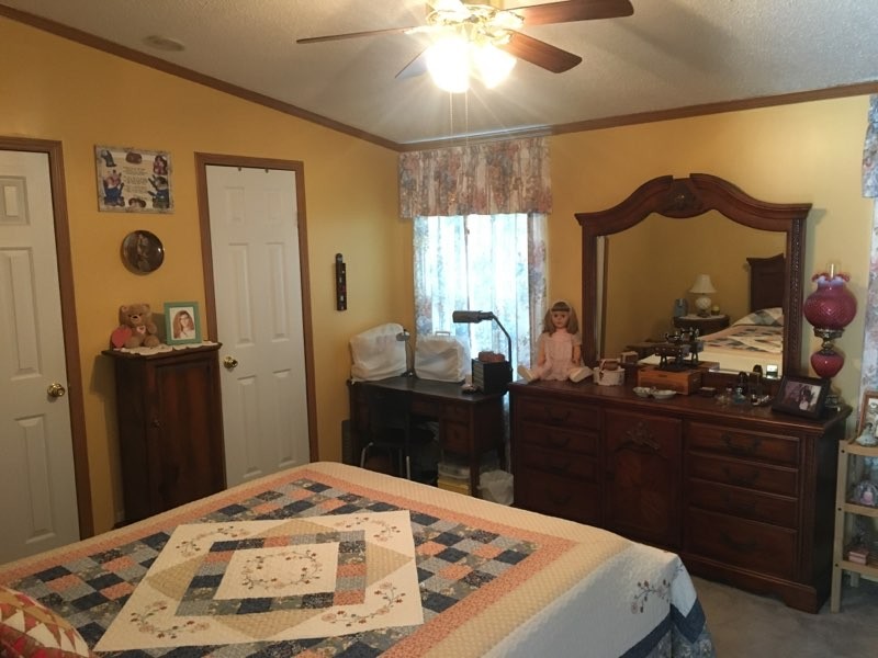 97 North Howard Fitch Road Kelso, TN 37348 - Photo 26 of 30 a kitchen with a refrigerator and a stove
