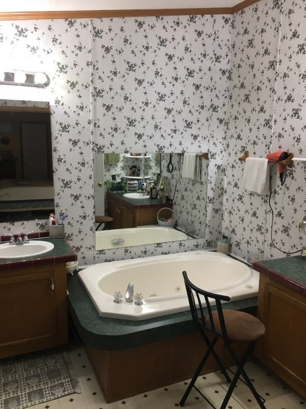 97 North Howard Fitch Road Kelso, TN 37348 - Photo 27 of 30 a bathroom with a bathtub and a sink