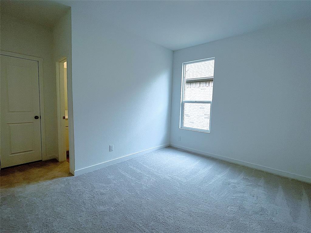 3020 Dutch Road Providence Village, TX 76227 - Photo 12 of 23 an empty room with windows