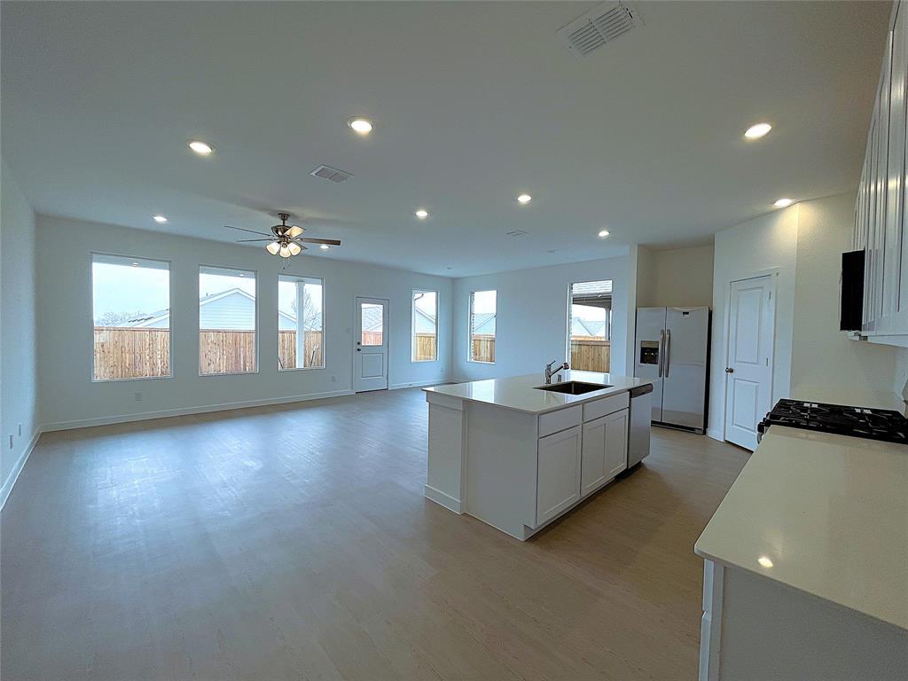 3020 Dutch Road Providence Village, TX 76227 - Photo 5 of 23 a living room with furniture and a large window