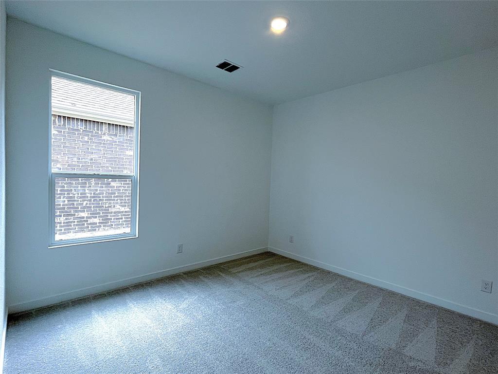 3020 Dutch Road Providence Village, TX 76227 - Photo 9 of 23 an empty room with a window