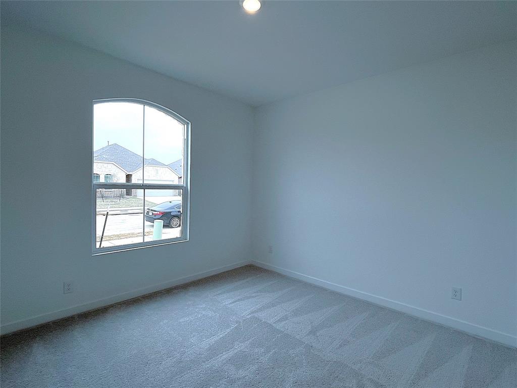 3020 Dutch Road Providence Village, TX 76227 - Photo 10 of 23 an empty room with a window