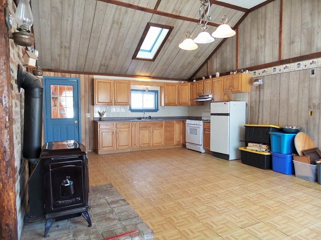 504 Carry Pond Road Bingham, ME 04920 - Photo 8 of 28 Living Room & Kitchen