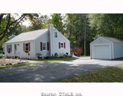 a black and white photo of a house