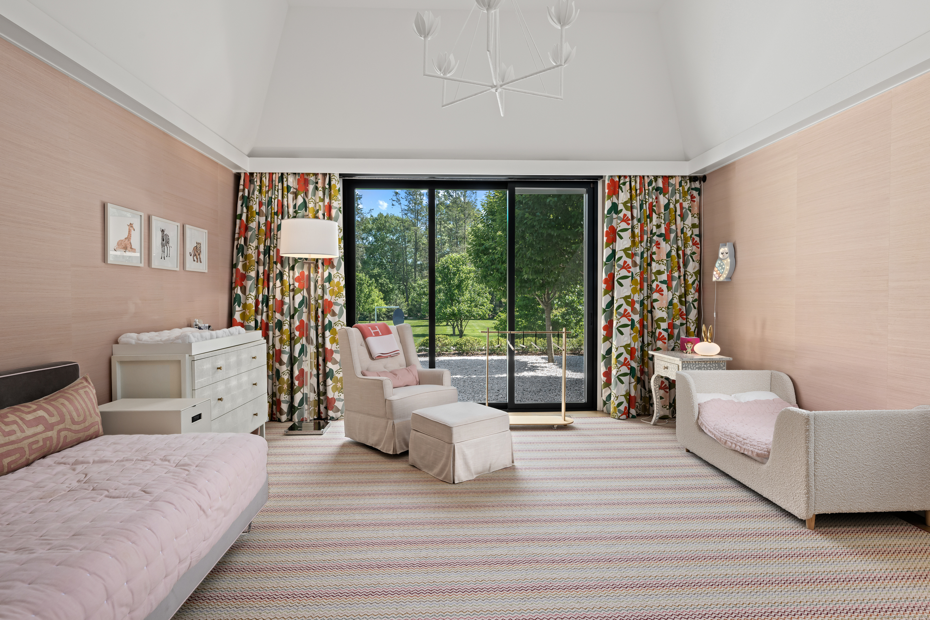 4900 Congress Street Fairfield, CT 06824 - Photo 30 of 40 a bedroom with a bed and a large window