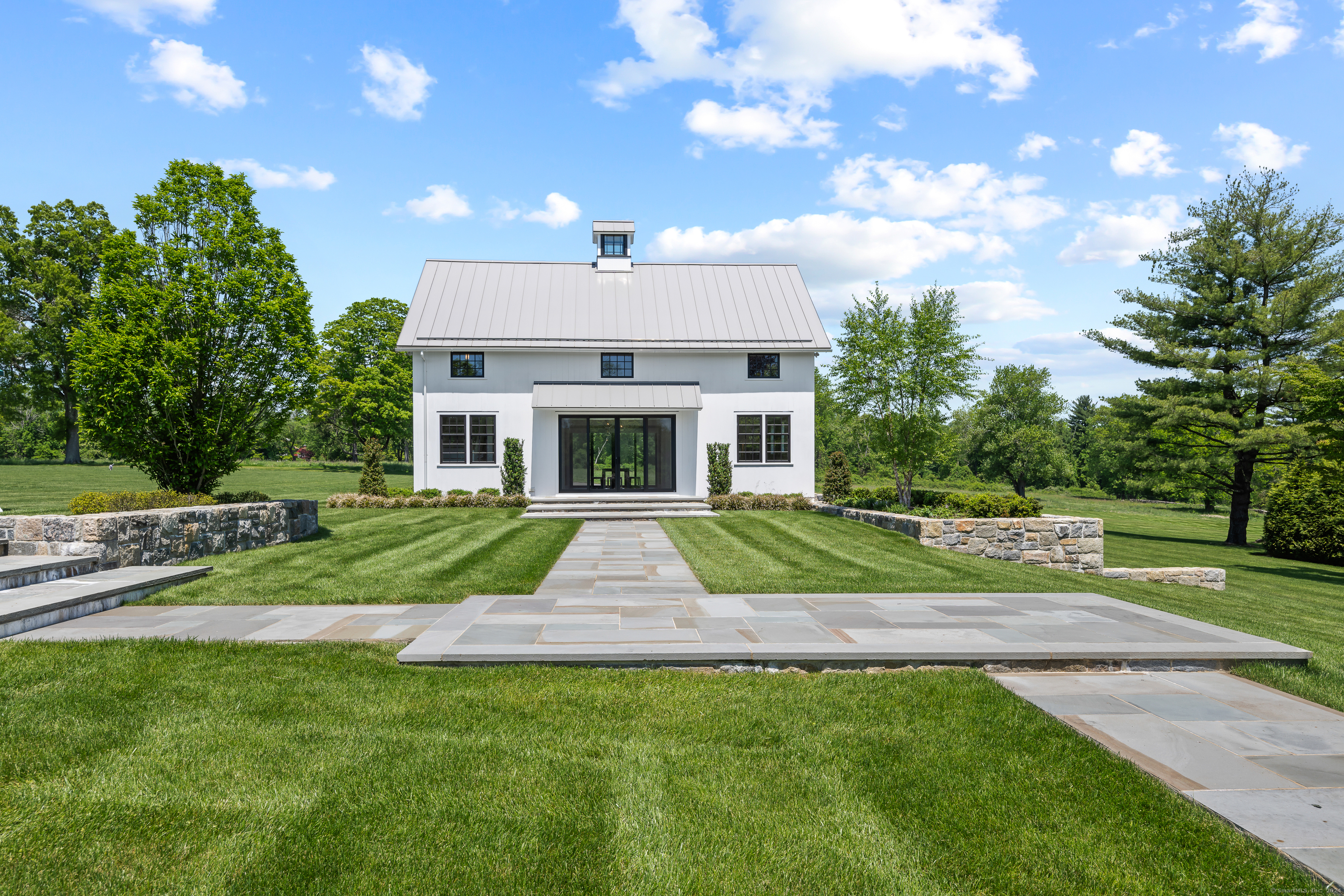 4900 Congress Street Fairfield, CT 06824 - Photo 35 of 40 a view of a yard in front of house with a yard