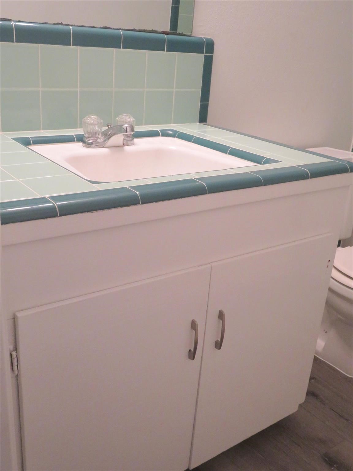 1519 Tobola Street Rosenberg, TX 77471 - Photo 21 of 31 full bathroom vanity with legacy tile