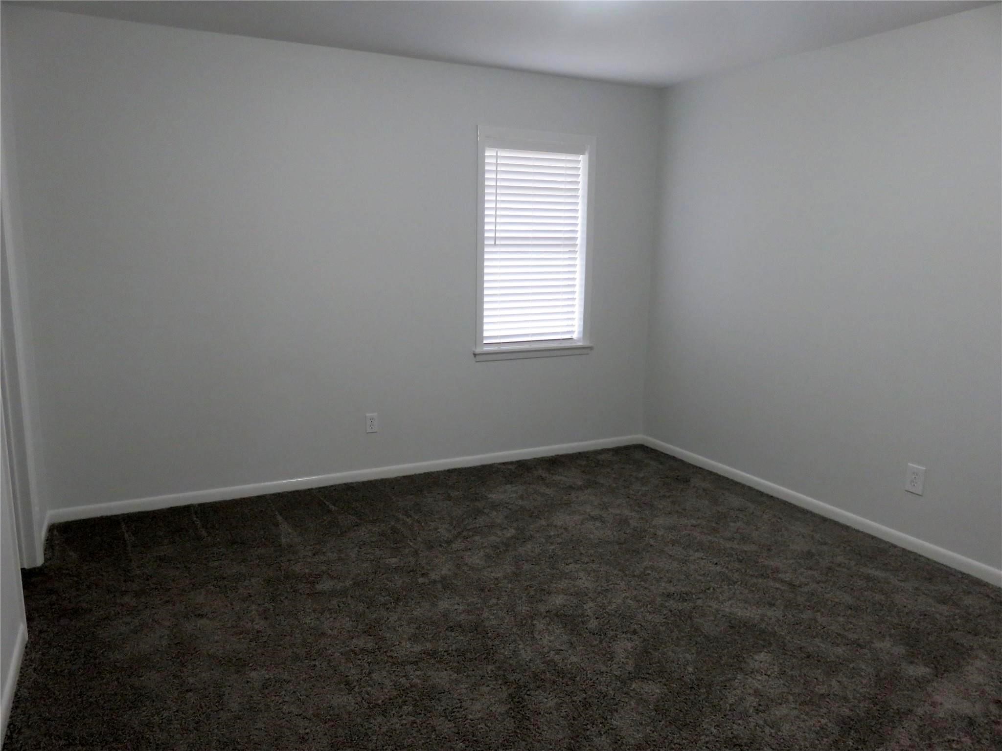 1519 Tobola Street Rosenberg, TX 77471 - Photo 24 of 31 The primary bedroom is spacious and has an ensuite half bath
