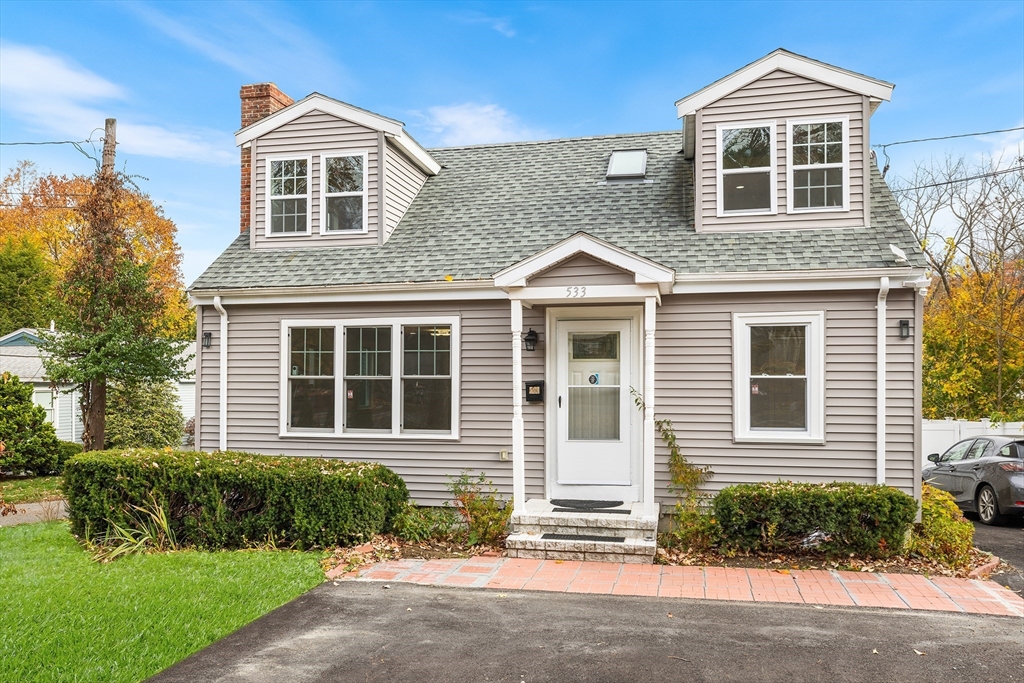 533 Marrett Road Lexington, MA 02421 - Photo 1 of 1 a front view of a house with a yard